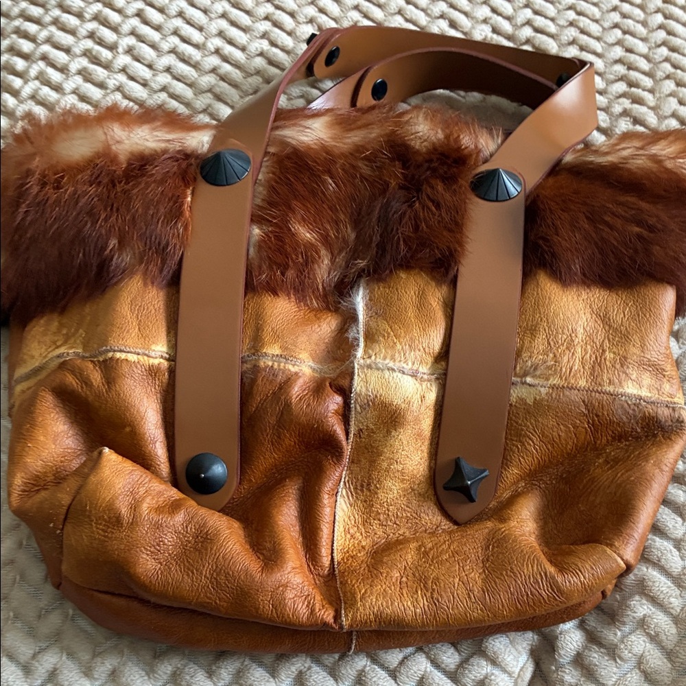 Francesco Biasia Brown Leather and Fur Women's Bag
Very unique